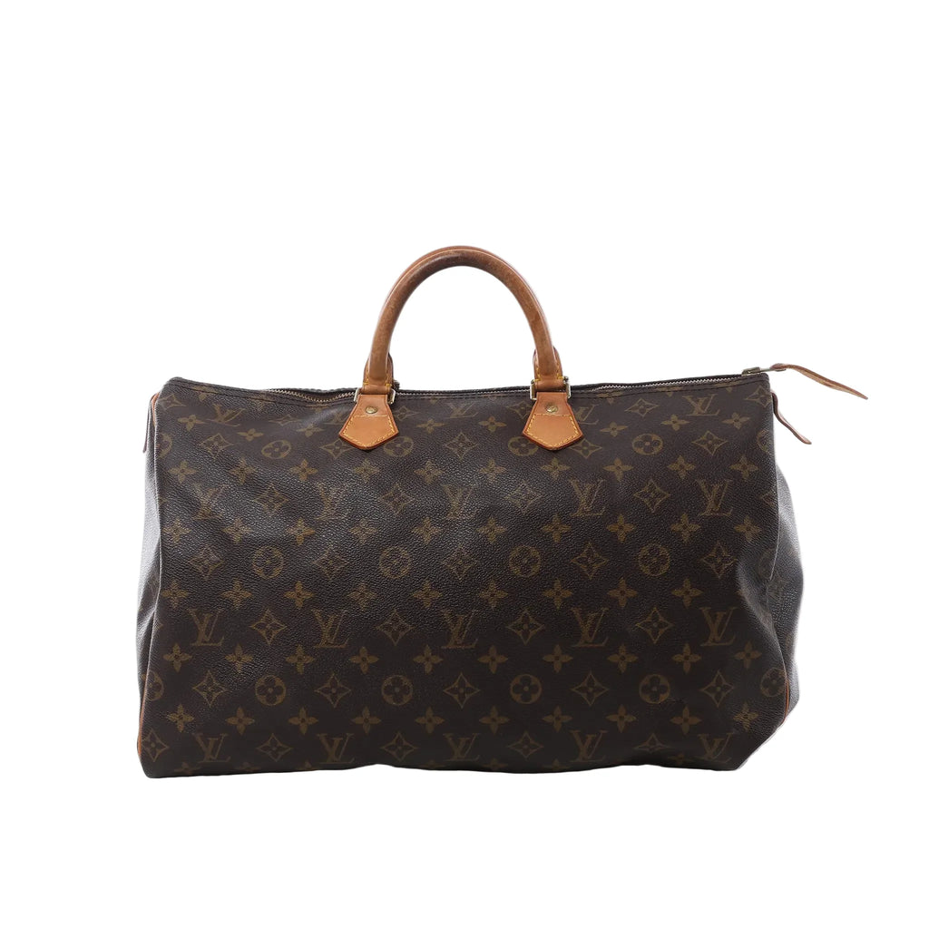 Louis Vuitton Speedy 40 handbag in brown Monogram canvas with tan vachetta leather handles, zip-top closure, and leather zipper pulls on white background.