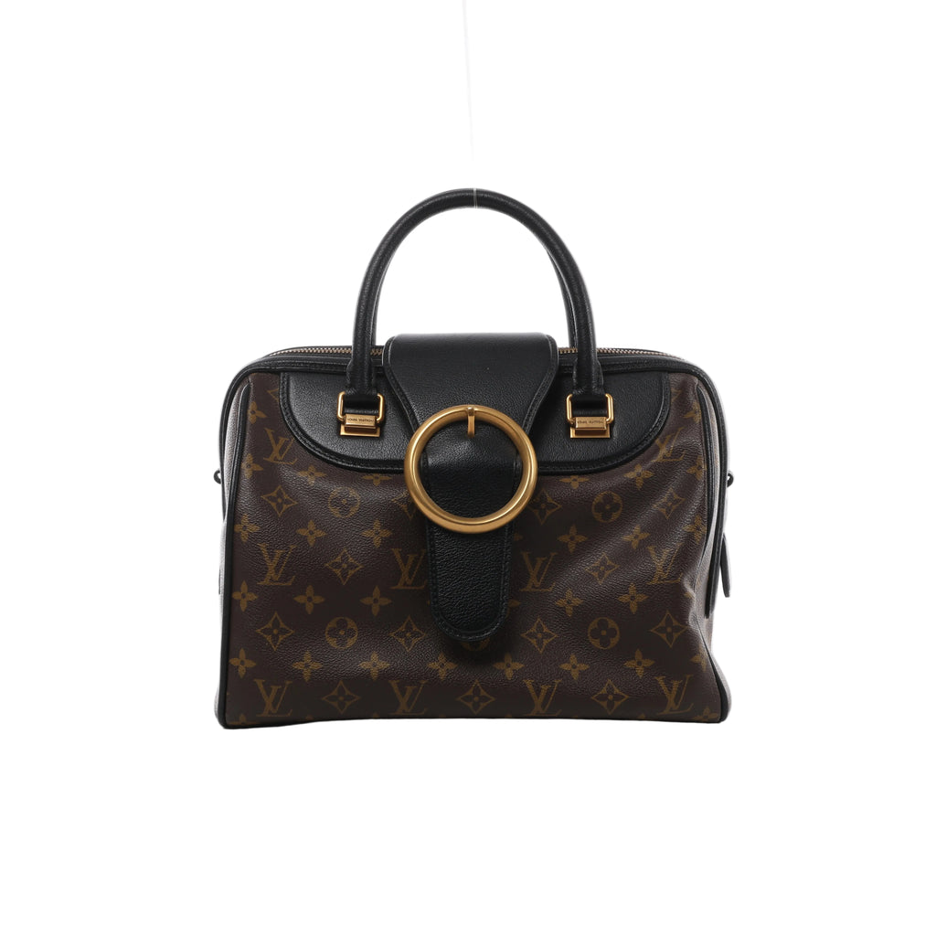 Front view of Louis Vuitton Golden Arrow Speedy 30 with brown Monogram canvas, black leather trim and handles, and a large gold-tone ring.