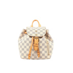 Louis Vuitton Sperone BB mini backpack in beige Damier Azur check canvas with tan leather top handle and trim, buckle-front flap, and side zip pocket.