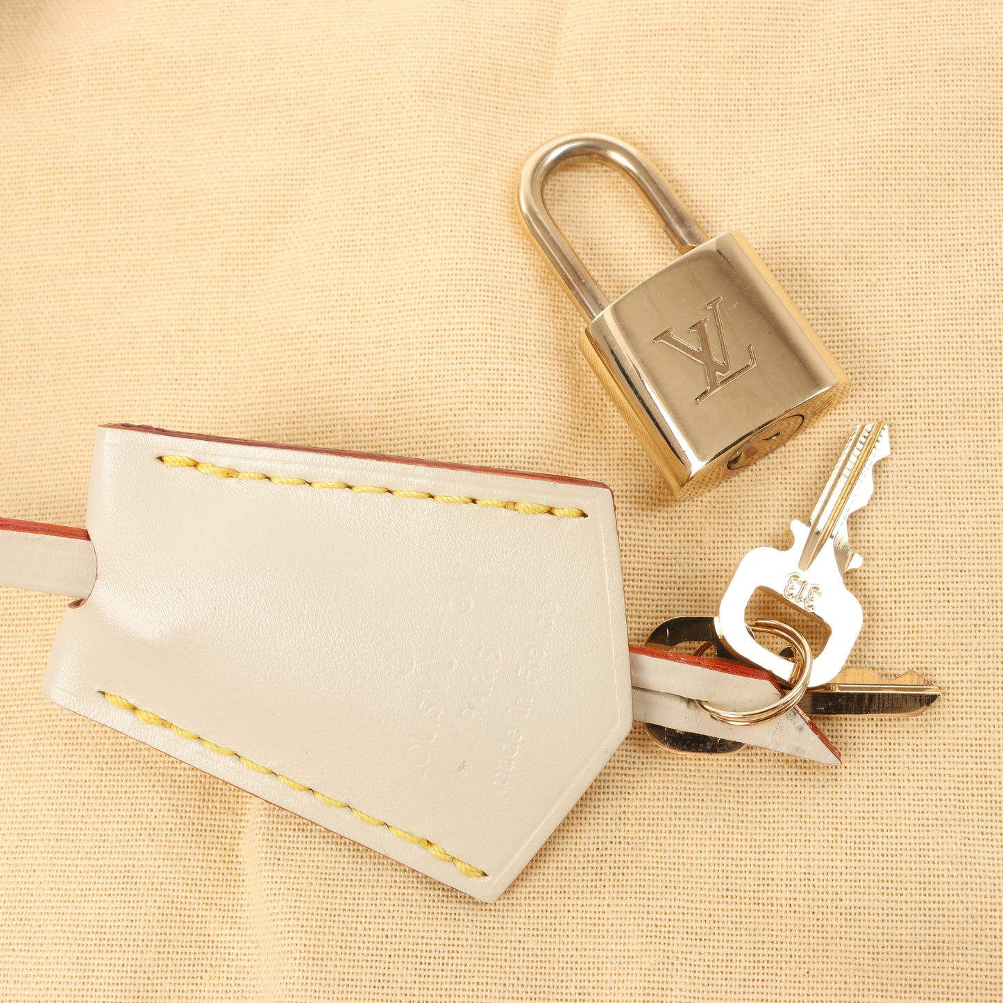 Louis Vuitton Suhali Lockit PM Handbag in Beige M91887