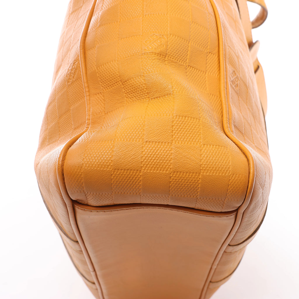 Bolso de mano Louis Vuitton Tadao PM Damier Infini en rojo N41268
