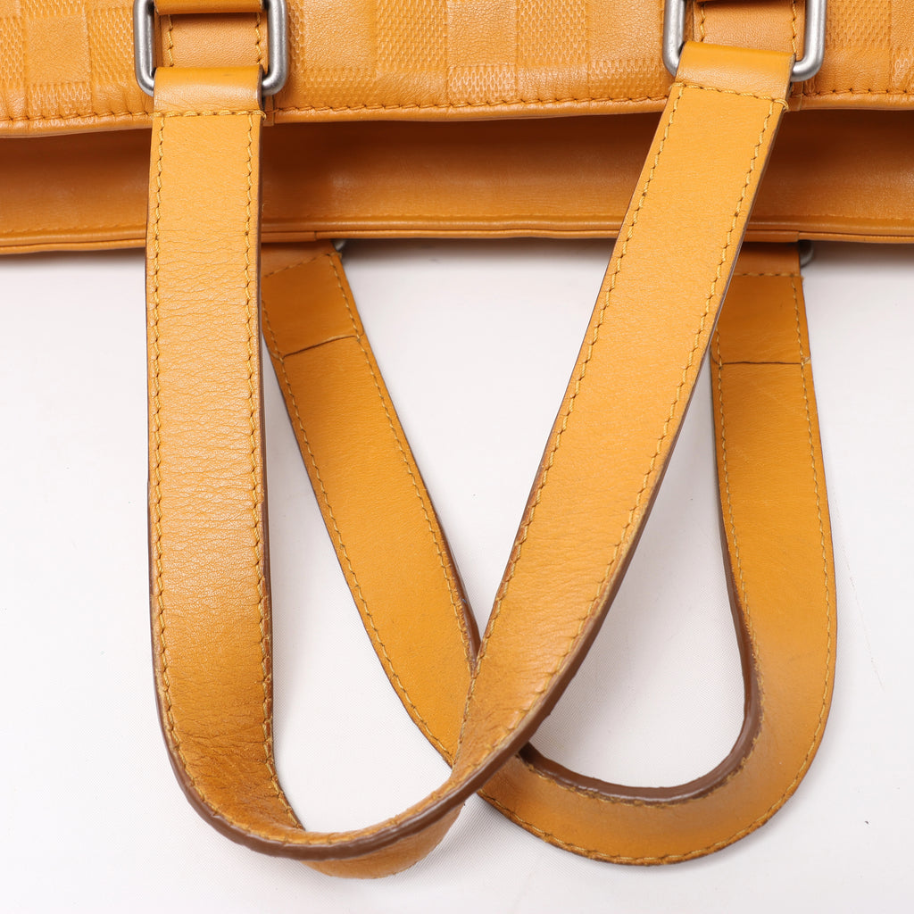 Bolso de mano Louis Vuitton Tadao PM Damier Infini en rojo N41268