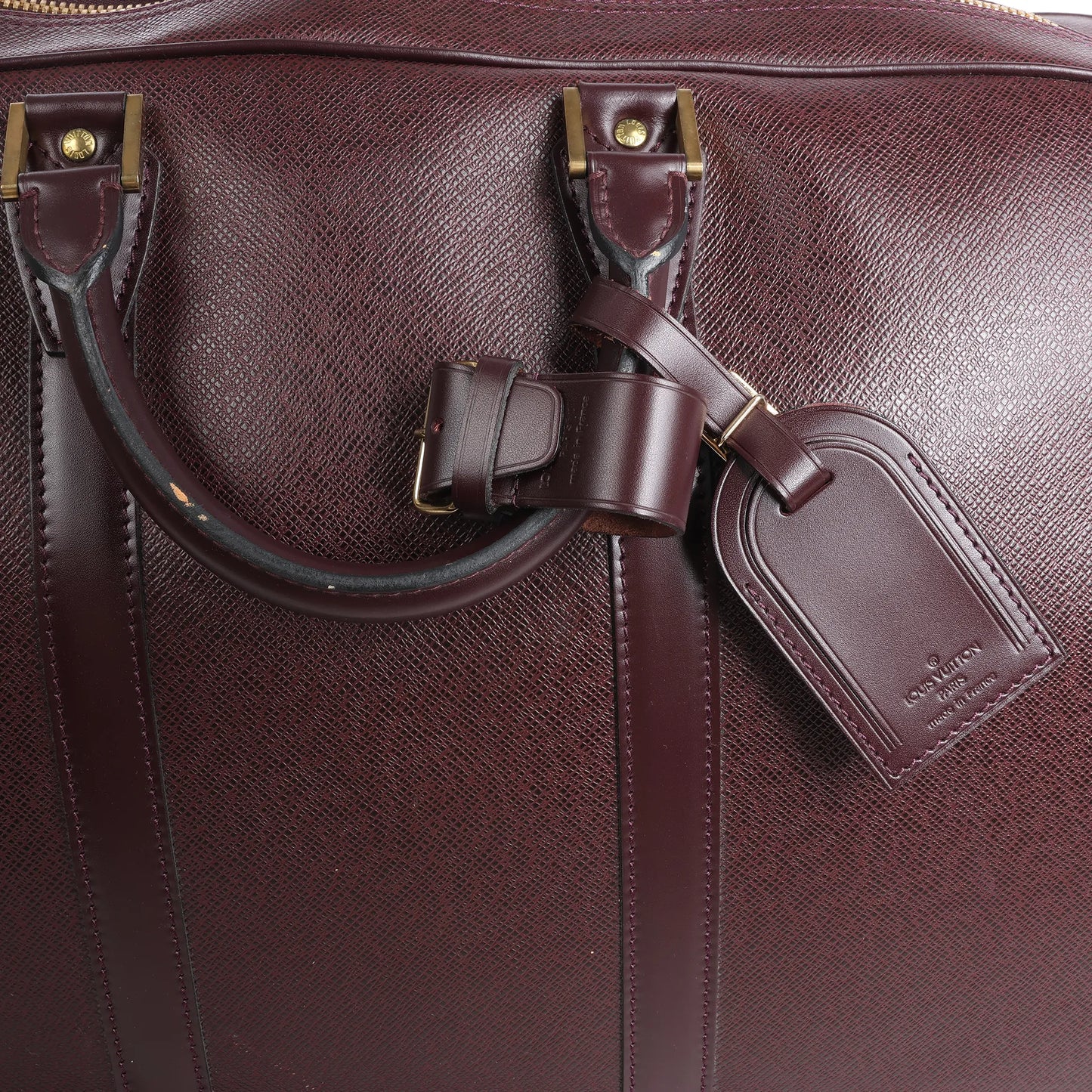 Louis Vuitton Taiga GM Kendall Travel bag in Burgundy