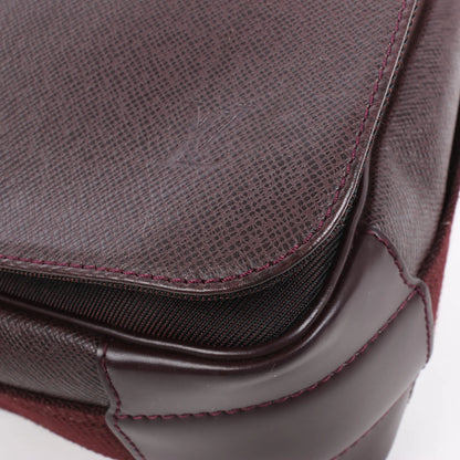 Louis Vuitton Taiga Viktor Shoulder Bag in Burgundy M30146