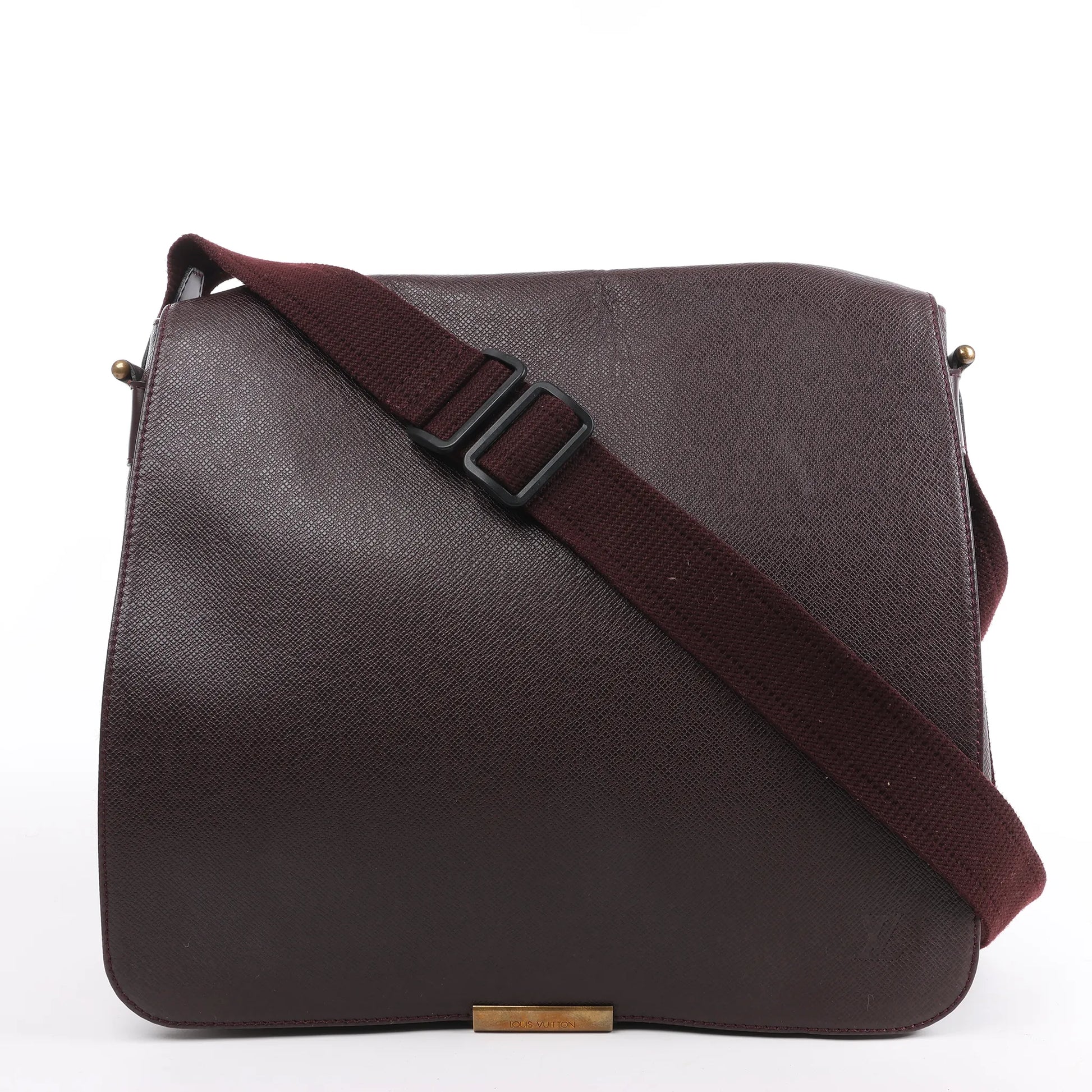 Louis Vuitton Taiga Viktor Shoulder Bag M30146 in burgundy textured leather with a matching adjustable canvas strap and gold-tone logo plate, displayed upright against a white background.