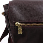 Louis Vuitton Taiga Viktor Shoulder Bag in Burgundy M30146
