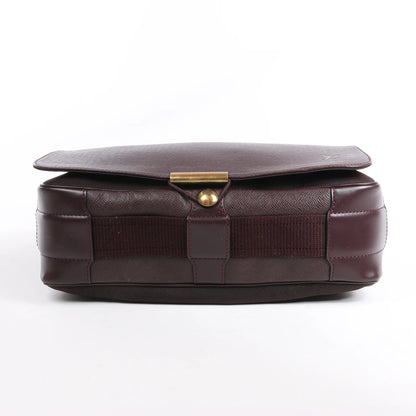 Louis Vuitton Taiga Viktor Shoulder Bag in Burgundy M30146