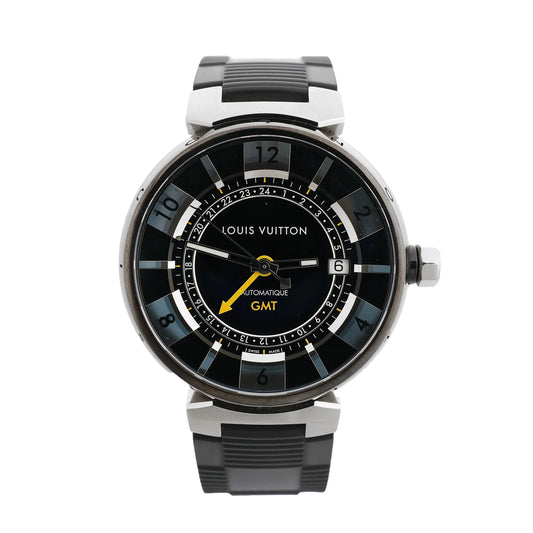 Louis Vuitton Tambour Q113K GMT watch with a black dial, yellow GMT hand, date window at 3 o’clock, stainless steel case, and black rubber strap.