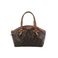 Louis Vuitton Tivoli GM handbag in brown Monogram canvas with natural leather adjustable shoulder handles, pleated front detail and zip-top closure.