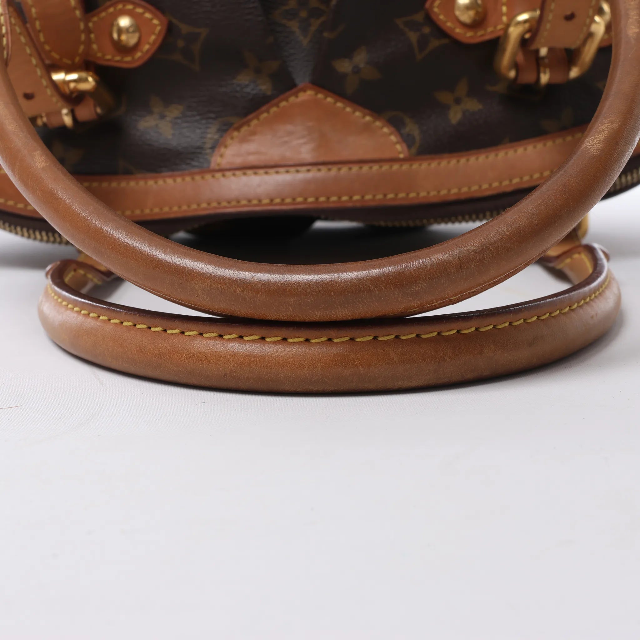 Louis Vuitton Tivoli GM Monogram Canvas Handbag in Brown M40144