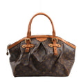 Louis Vuitton Tivoli GM handbag M40144 in brown Monogram canvas with structured top handles, pleated body, gold-tone hardware, and natural leather trim, displayed upright on a white background.