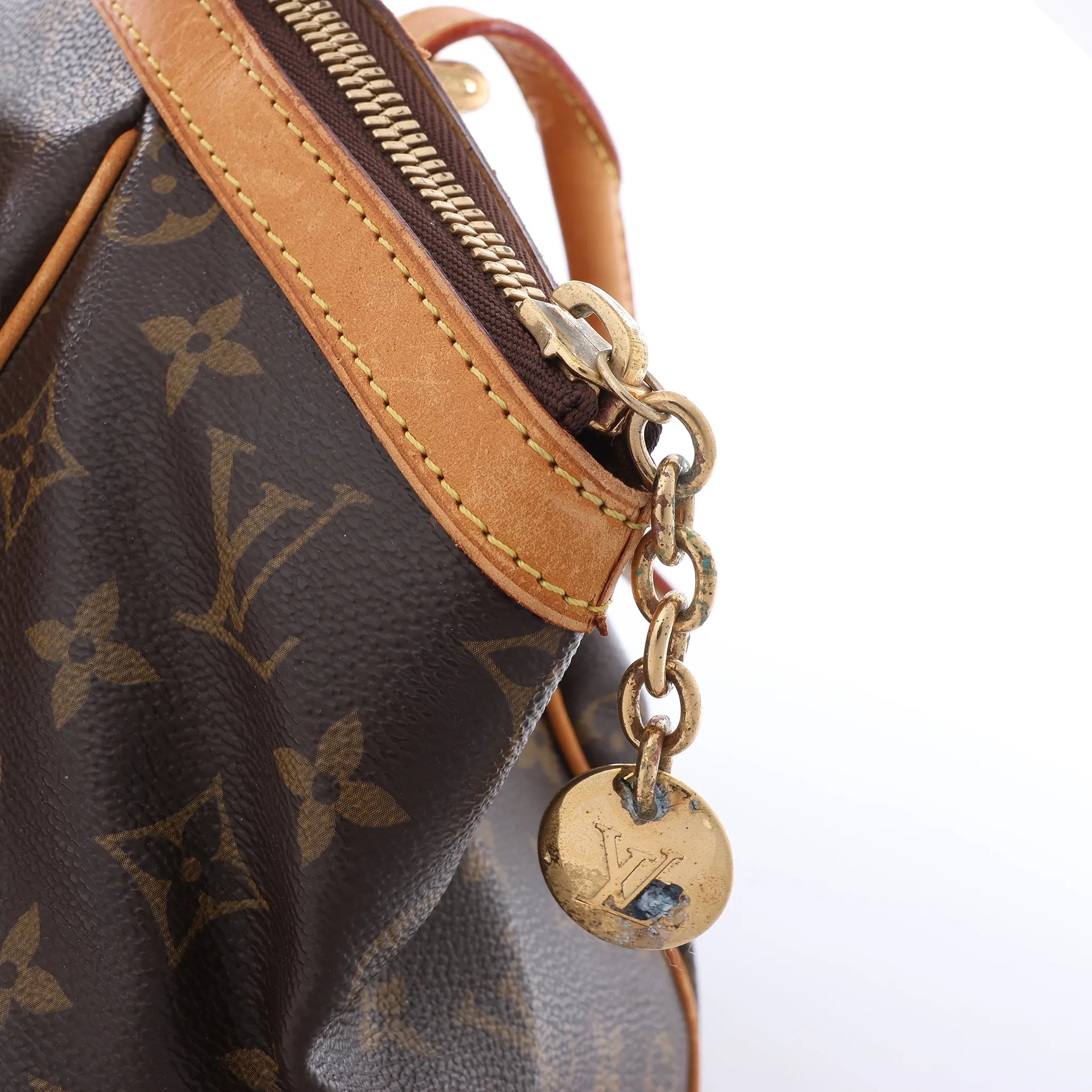 Louis Vuitton Tivoli GM Monogram Canvas Handbag in Brown M40144