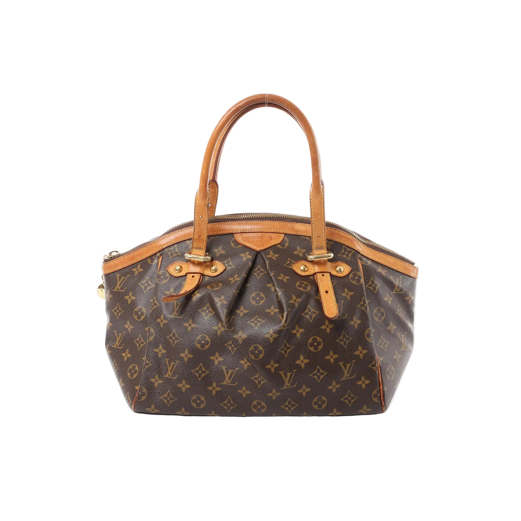 Louis Vuitton Tivoli GM handbag in brown Monogram canvas with tan leather trim, double top handles, and zip-top closure on white background