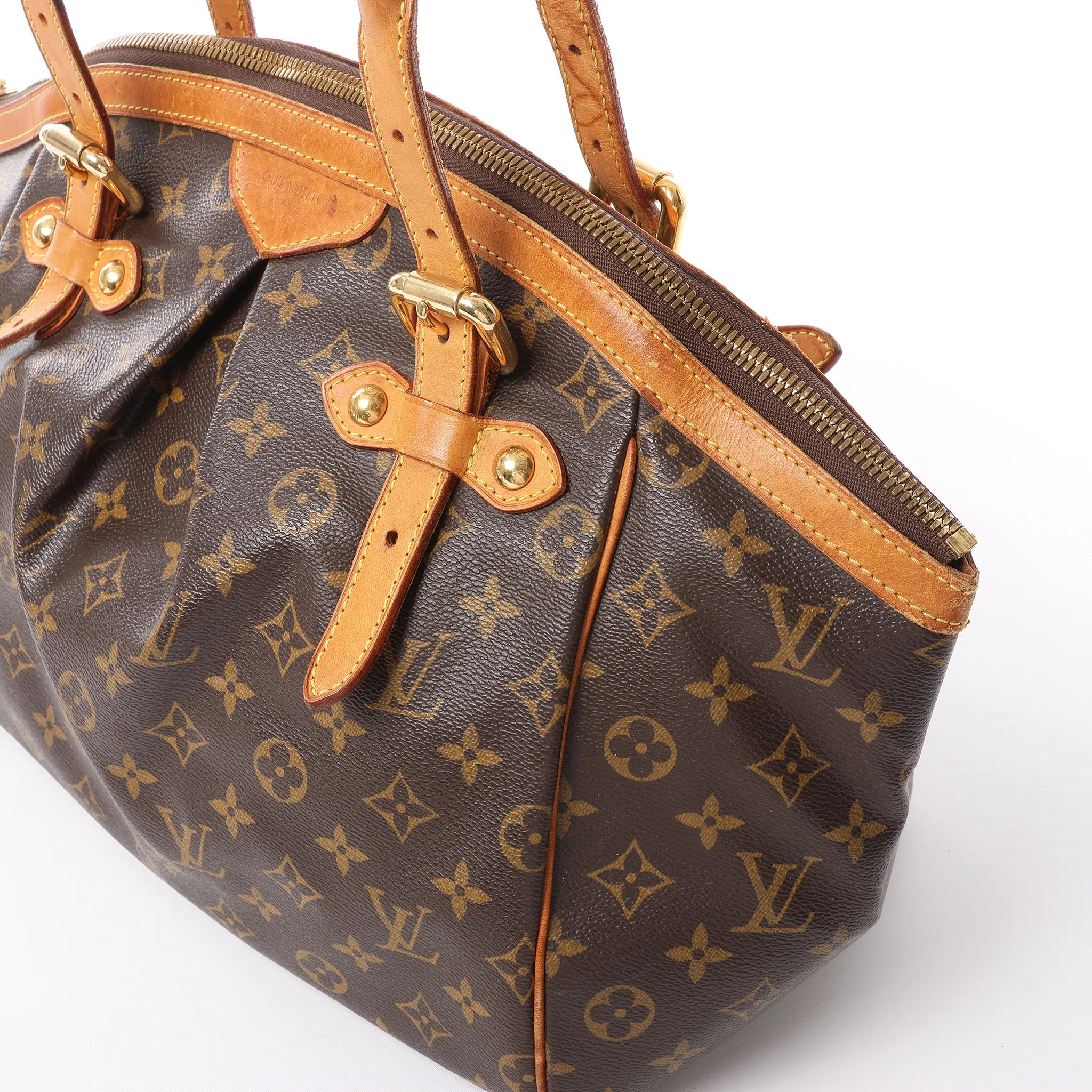 Louis Vuitton Tivoli GM Monogram Canvas Handbag in Brown M40144