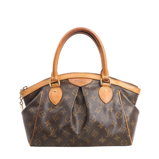 Louis Vuitton Monogram Canvas Tivoli PM handbag in brown with natural leather handles and trim, pleated front design, and gold-tone hardware.