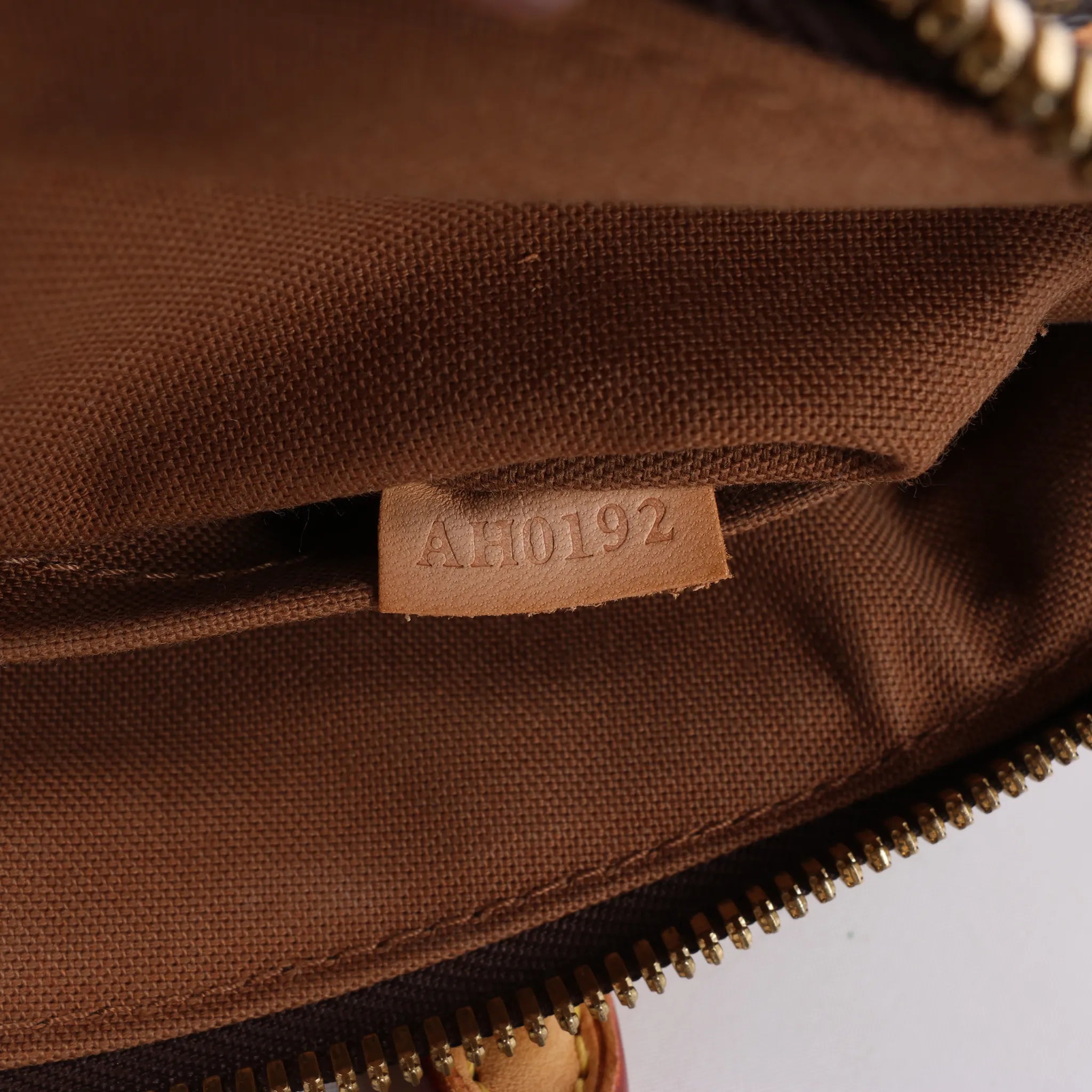 Louis Vuitton Tivoli PM Monogram Canvas Handbag in Brown M40143