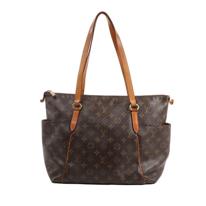 Louis Vuitton Monogram Totally MM Shoulder Bag M56689 in brown coated canvas with natural leather trim, dual long shoulder straps, side pockets, and zip closure, displayed upright against a white background.