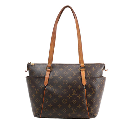 Louis Vuitton Monogram Totally PM Shoulder Bag in brown coated canvas with natural leather straps, side pockets, and gold-tone zipper closure, shown against a white background.