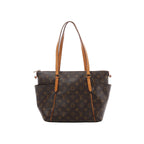 Brown Louis Vuitton Totally PM Monogram canvas shoulder bag with natural leather straps, gold-tone hardware and two exterior side pockets.