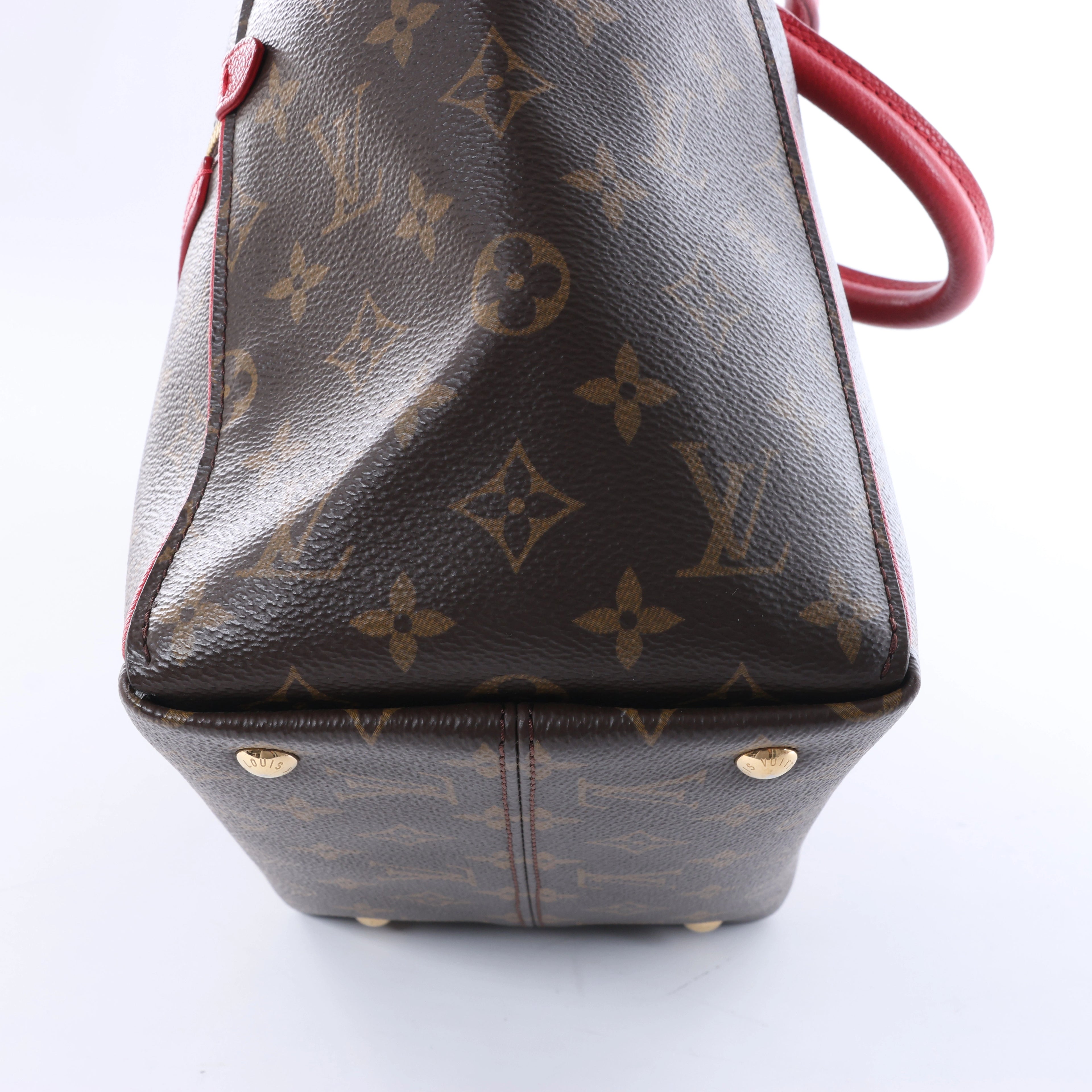Louis Vuitton Tournelle PM Monogram Canvas Handbag in Brown x Red M44027