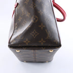 Louis Vuitton Tournelle PM Monogram Canvas Handbag in Brown x Red M44027