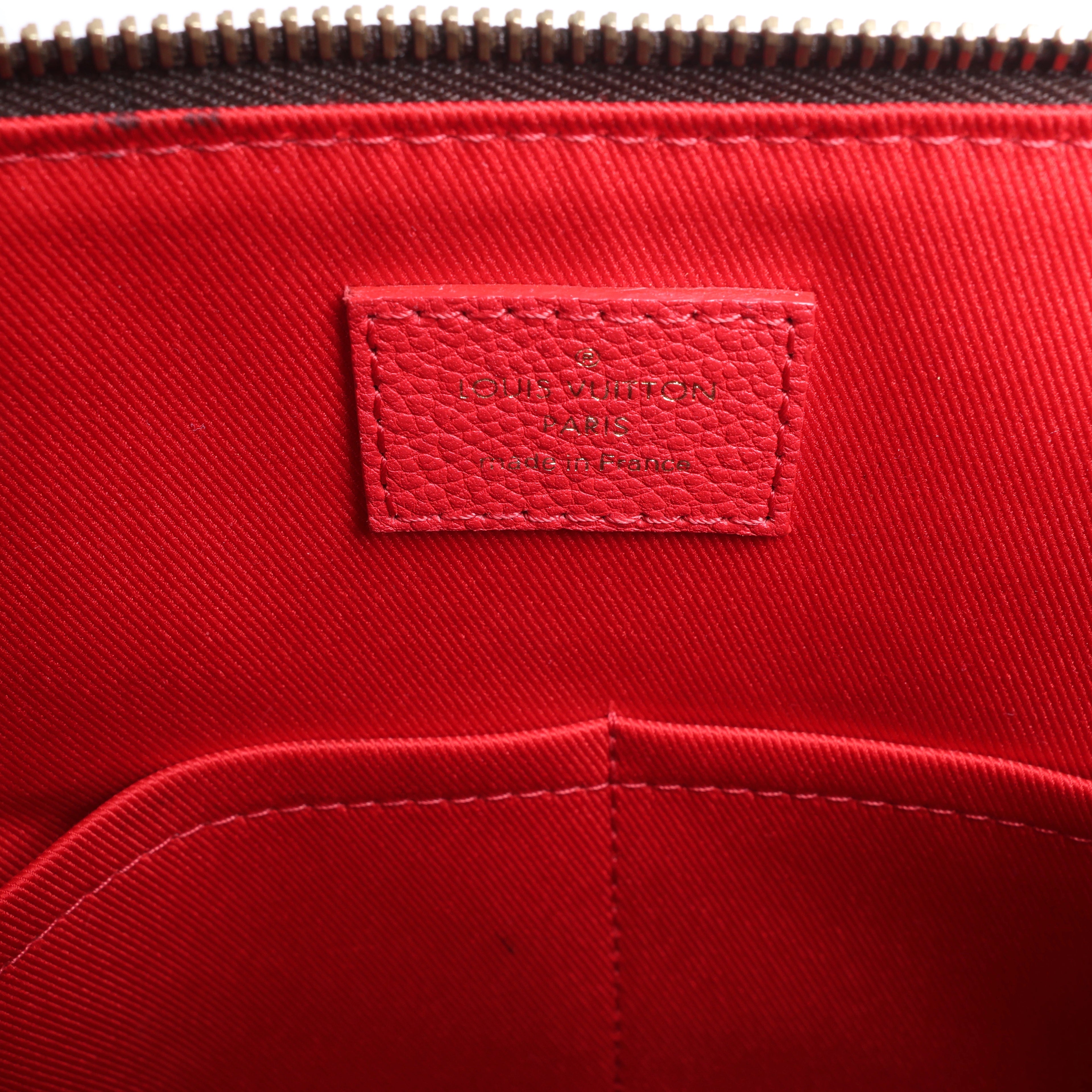 Louis Vuitton Tournelle PM Monogram Canvas Handbag in Brown x Red M44027