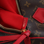 Louis Vuitton Tournelle PM Monogram Canvas Handbag in Brown x Red M44027
