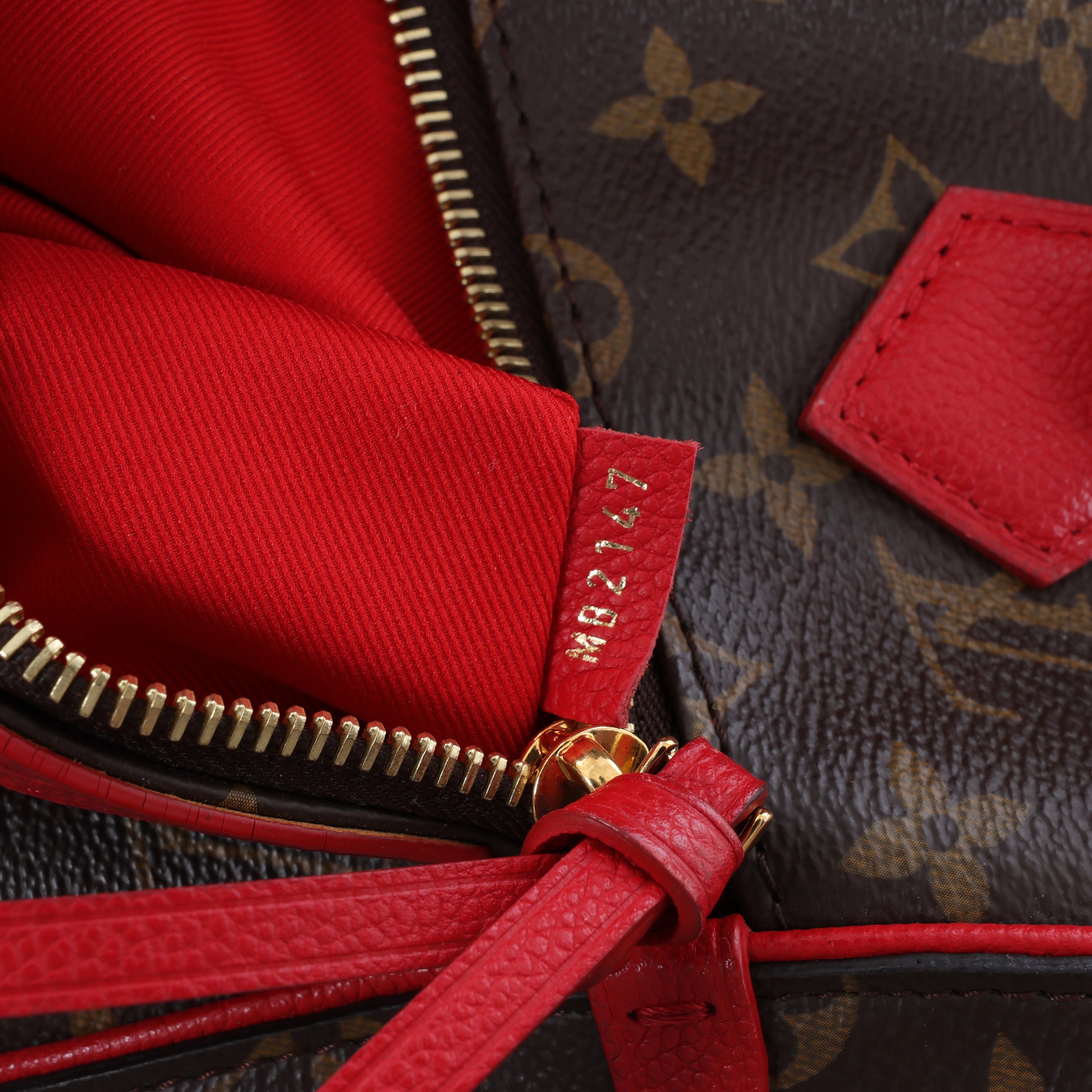 Louis Vuitton Tournelle PM Monogram Canvas Handbag in Brown x Red M44027