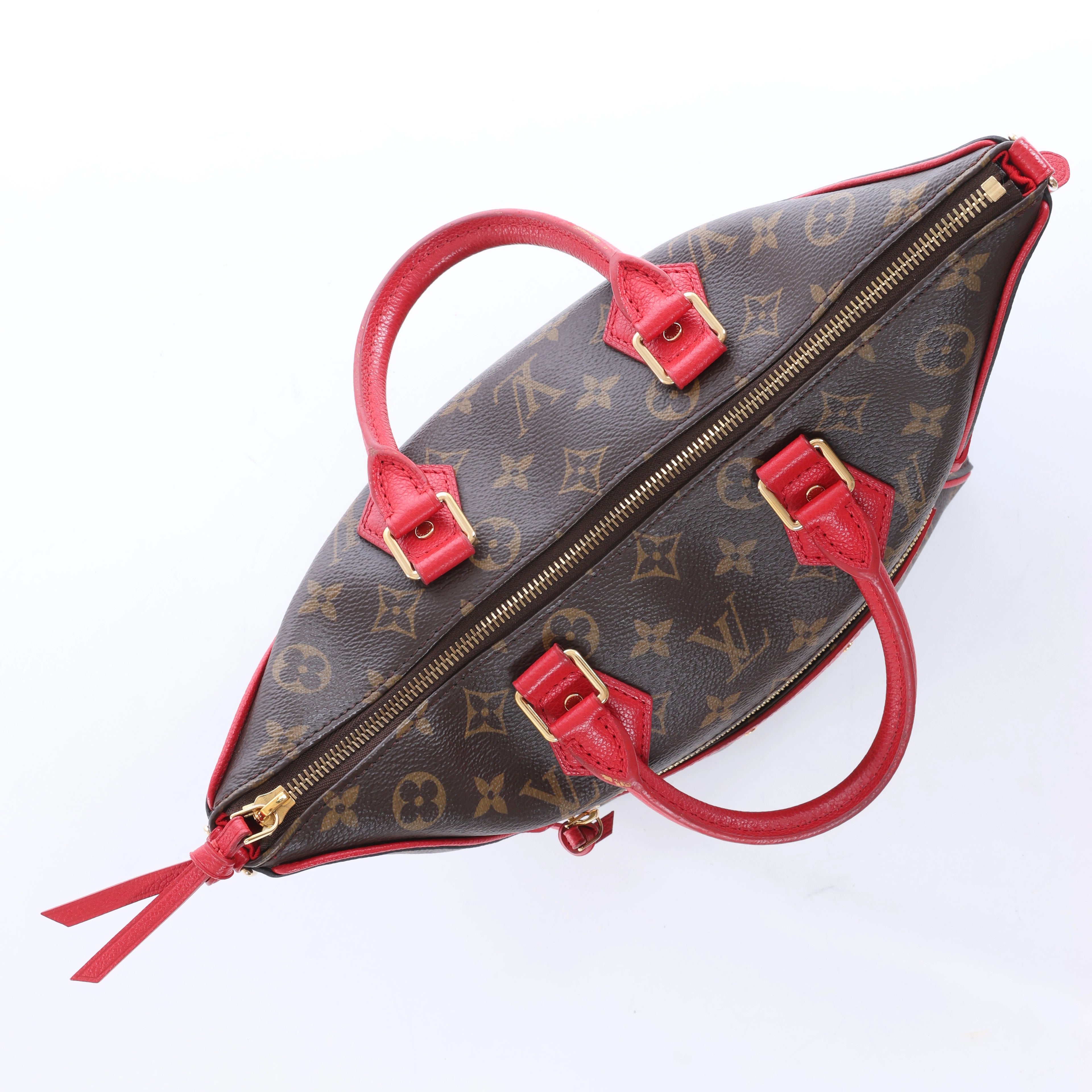 Louis Vuitton Tournelle PM Monogram Canvas Handbag in Brown x Red M44027