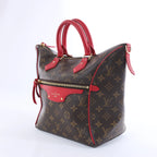 Louis Vuitton Tournelle PM Monogram Canvas Handbag in Brown x Red M44027