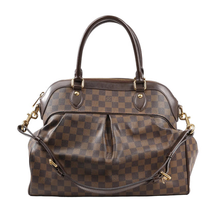 Front view of Louis Vuitton Trevi GM handbag in Damier Ebene canvas, featuring brown checkerboard pattern, pleated front design, rolled leather handles, detachable shoulder strap, and gold-tone hardware.