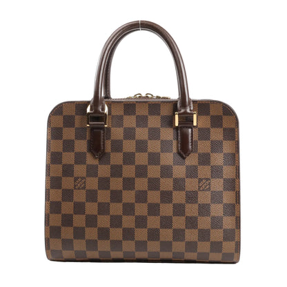 Louis Vuitton Triana handbag N51155 in brown Damier Ebene coated canvas, featuring a boxy silhouette, rolled leather top handles, gold-tone hardware, and checkered pattern with smooth leather trim.