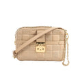 Beige Louis Vuitton Troca MM Damier quilt leather crossbody bag with gold-tone padlock clasp, chain strap detail, and adjustable shoulder strap.