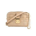 Beige Louis Vuitton Troca MM Damier quilt leather crossbody bag with gold-tone padlock clasp, chain strap detail, and adjustable shoulder strap.