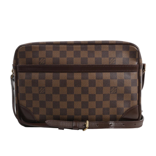 Louis Vuitton Damier Ebene Trocadero 30 Crossbody Bag N48082 in brown checkered coated canvas with dark brown leather trim, front pocket, and adjustable shoulder strap, displayed upright against a white background.