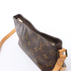 Bolso bandolera de lona con monograma Trotteur de Louis Vuitton en marrón M51240