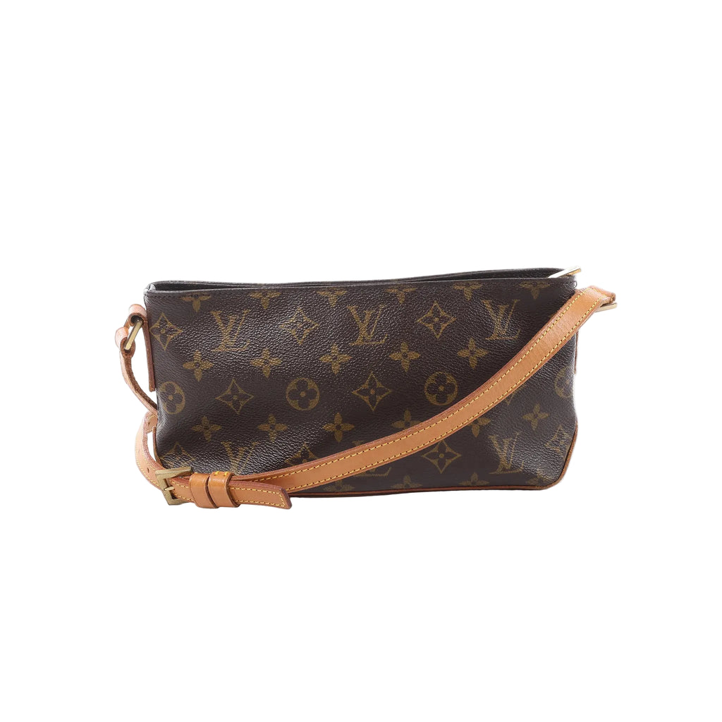 Louis Vuitton Trotteur crossbody bag in brown Monogram canvas with a tan adjustable leather strap, top zip closure and slim rectangular shape.