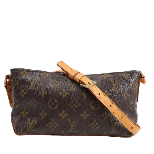 Louis Vuitton Trotteur Shoulder Bag M51240 in brown Monogram coated canvas with natural vachetta leather trim, adjustable leather shoulder strap, and gold-tone hardware, displayed against a white background.
