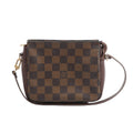 Brown Louis Vuitton Truth Makeup bag in Damier Ebene checkerboard canvas with dark leather sides, slim shoulder strap and gold-tone hardware.