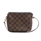 Brown Louis Vuitton Truth Makeup bag in Damier Ebene checkerboard canvas with dark leather sides, slim shoulder strap and gold-tone hardware.