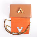 Louis Vuitton Twist MM Catgram x Taurillon Crossbody Bag in Brown x Orange M44408