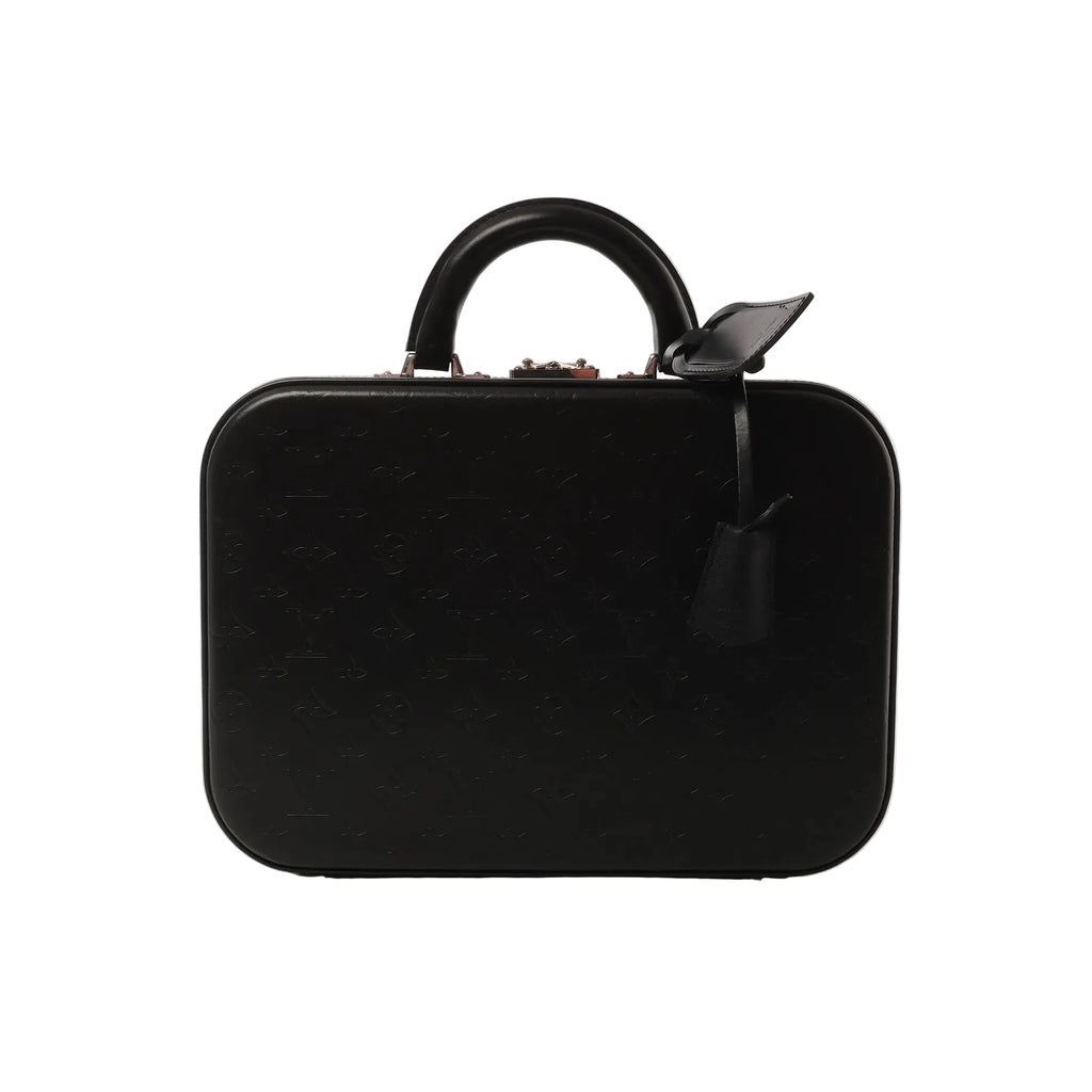 Louis Vuitton Valisette MM handbag in black Monogram Glace leather with embossed monogram pattern, rigid suitcase-style shape, top handle, and hanging leather tag on white background.