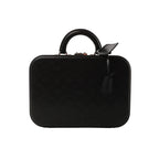 Louis Vuitton Valisette MM handbag in black Monogram Glace leather with embossed monogram pattern, rigid suitcase-style shape, top handle, and hanging leather tag on white background.