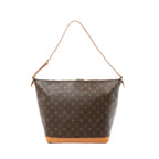 Louis Vuitton shoulder bag in brown Monogram canvas with tan vachetta leather base and adjustable shoulder strap, zip-top closure, front view on white background.