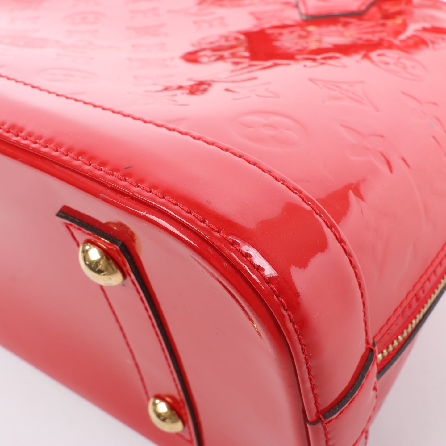 LOUIS VUITTON Vernis Alma PM Handbag in Red M90096
