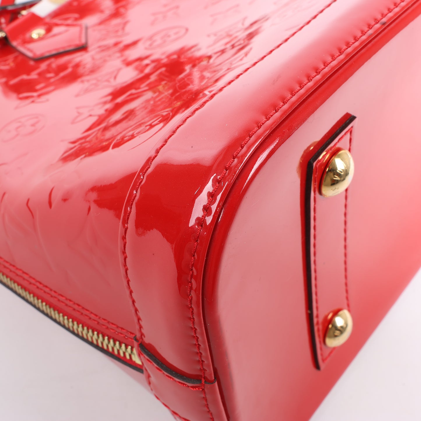 LOUIS VUITTON Vernis Alma PM Handbag in Red M90096