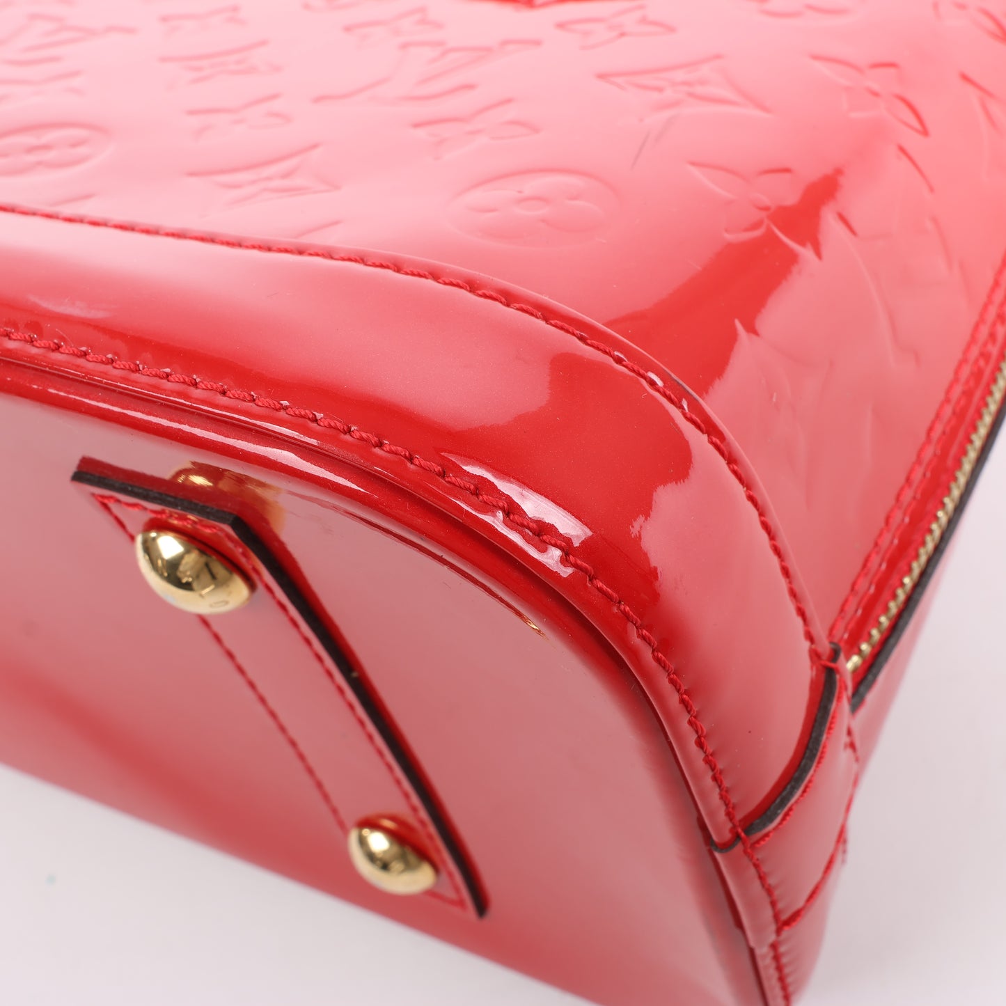 LOUIS VUITTON Vernis Alma PM Handbag in Red M90096