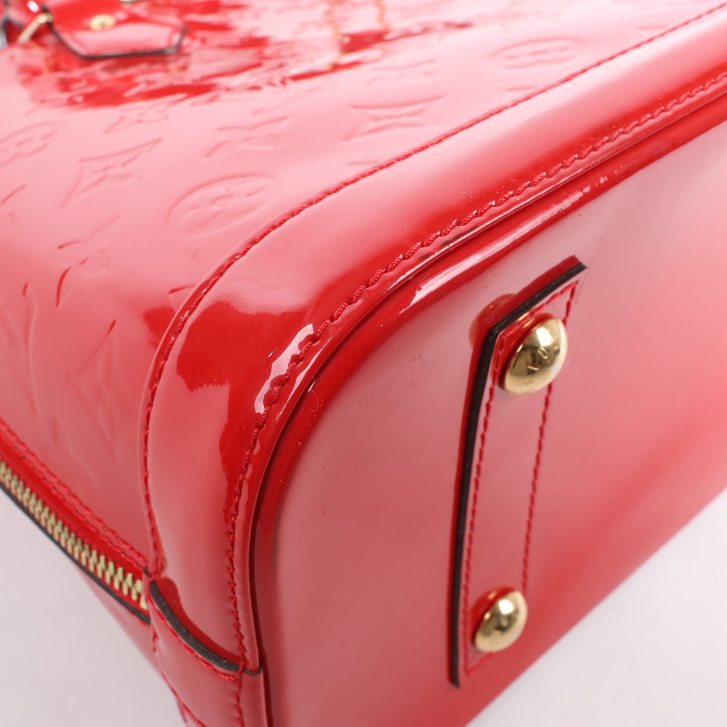 LOUIS VUITTON Vernis Alma PM Handbag in Red M90096
