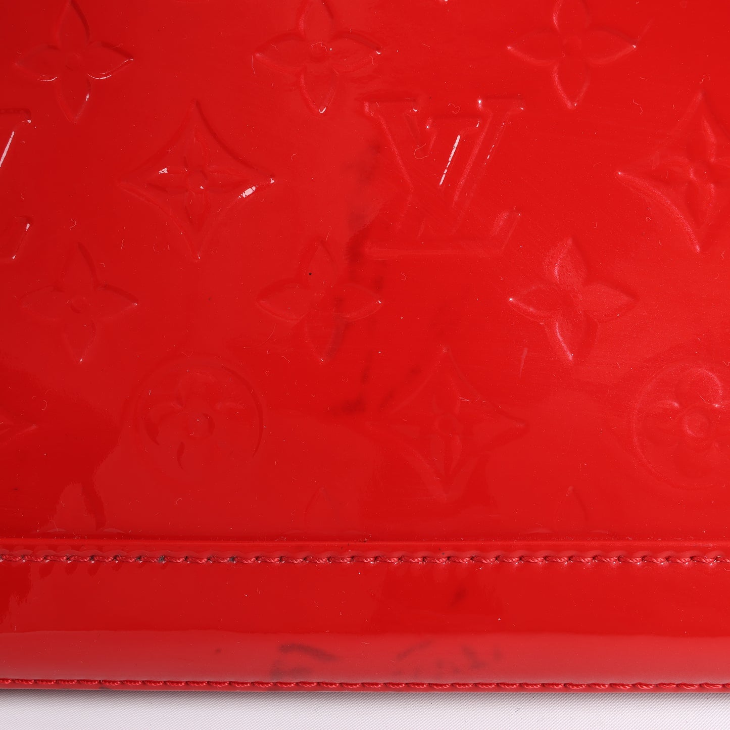 LOUIS VUITTON Vernis Alma PM Handbag in Red M90096