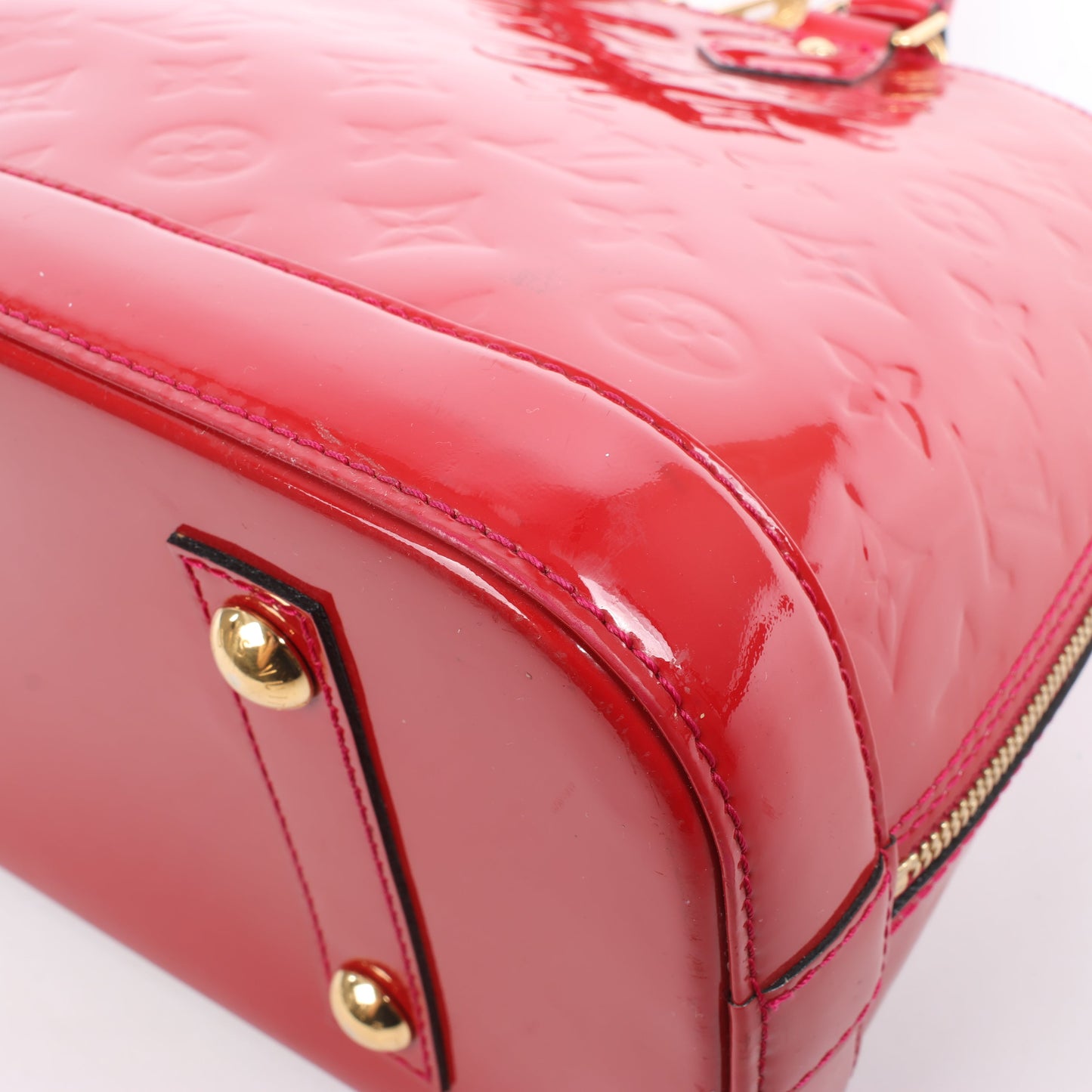 LOUIS VUITTON Vernis Alma PM Handbag in Red M91770